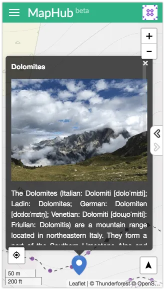 Mobile view of a MapHub map showing a full-height, scrollable popup displaying an image and description of the Dolomites, demonstrating optimized mobile popup design.