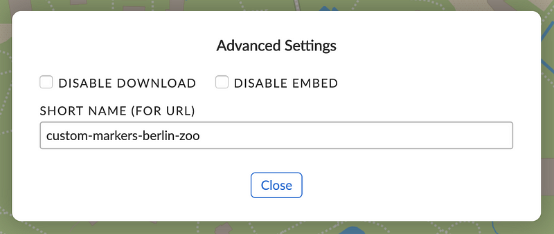 A screenshot of the MapHub 'Advanced Settings' dialog, showing checkboxes to disable map download and embedding, and a field for the map's short URL name.